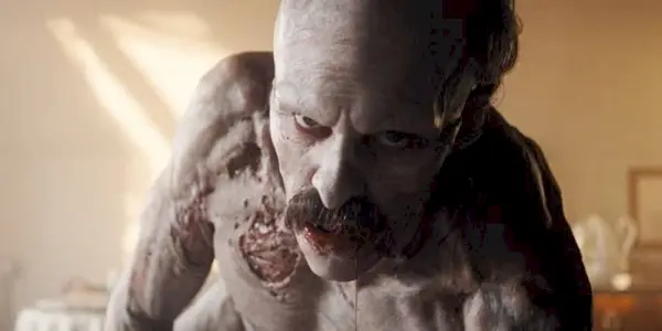 Bill Skarsgård as Count Orlok looking directly at the camera in Nosferatu