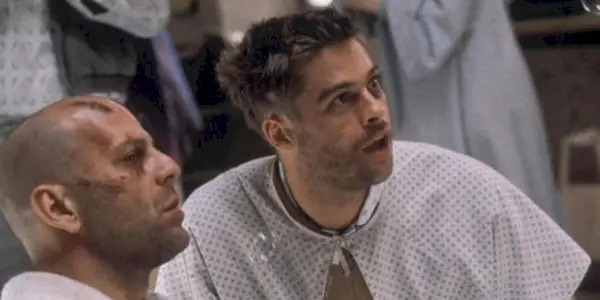 Jeffrey and James looking in the same direction while at a mental isntitution in 12 Monkeys