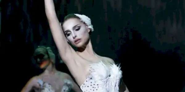 Nina performing Swan Lake on stage in 