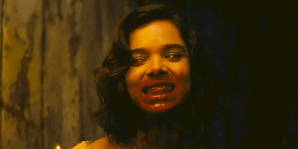 Hailee Steinfeld as Mary with blood around her mouth in Sinners