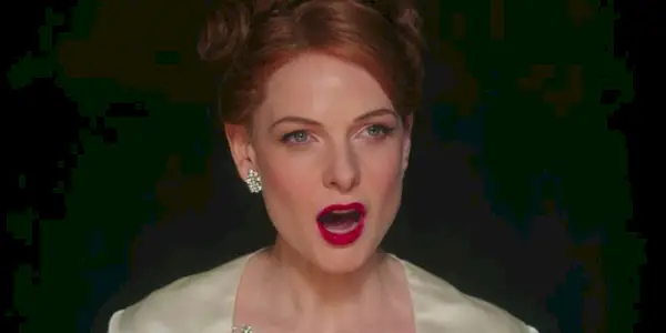 The Greatest Showman close up still image of Rebecca Ferguson singing 
