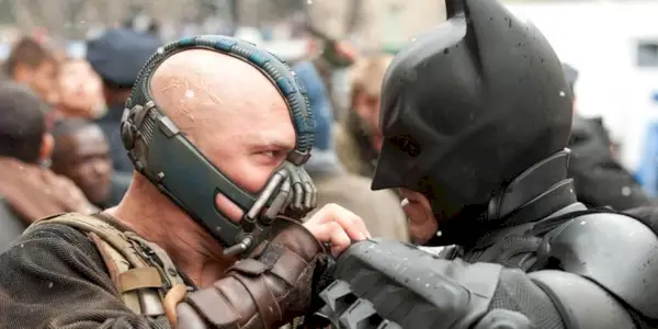 Bane (Tom Hardy) and Batman (Christian Bale) fighting in The Dark Knight Rises
