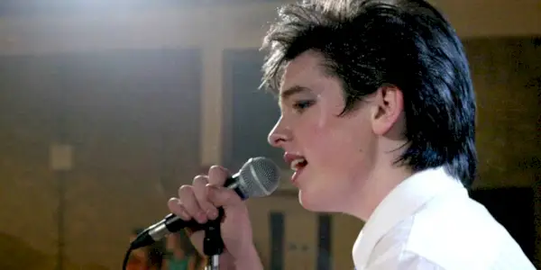 Ferdia Walsh-Peelo as Conor singing To Find You in Sing Street (2016)