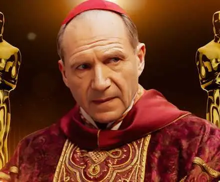 An image of Ralph Fiennes in Conclave surrounded by Oscar statuettes.