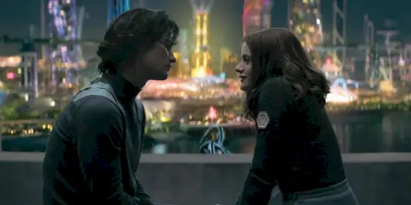 Joey King and Chase Stokes sitting across from each other in a scene from 