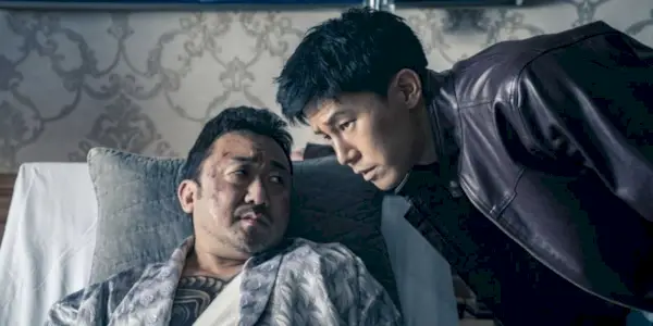 The crime boss is talking to his minion