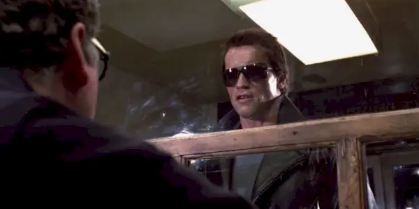 The Terminator, played by actor Arnold Schwarzenegger, in a police station lobby in 