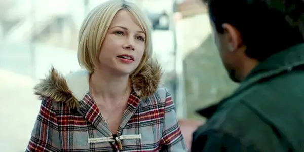 Randi looking emotional while talking to a man in Manchester By The Sea