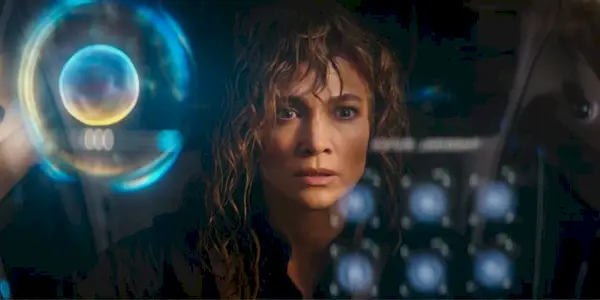 Atlas Shepherd looking worried in a scene from the Netflix sci-fi thriller, Atlas.