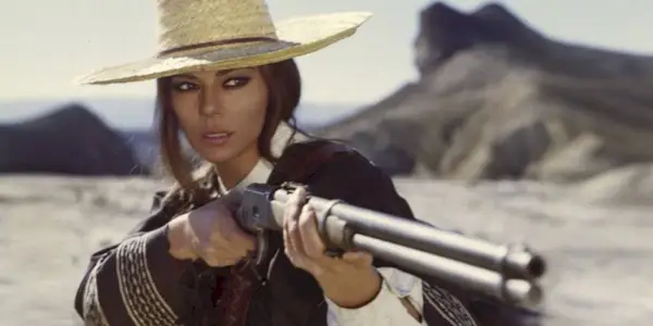 Columba aiming a rifle in The Mercenary (1968)