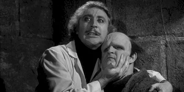 Doctor Frankenstein hugging his creation in Young Frankenstein 