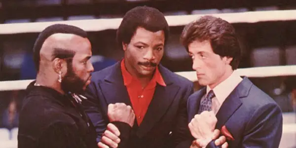 Mr. T as Clubber Lang and Sylvester Stallone as Rocky with Carl Weathers as Apollo Creed in the ring in Rocky III