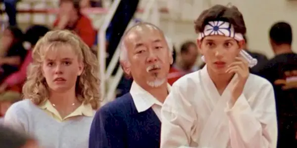 Ralph Macchio, Elizabeth Shue and Pat Morita in The Karate Kid