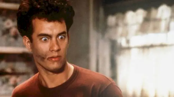 Tom Hanks as Walter Fielding looking shocked in The Money Pit.