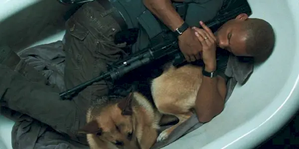 Will Smith and his dog laying in a bathtub in I Am Legend.