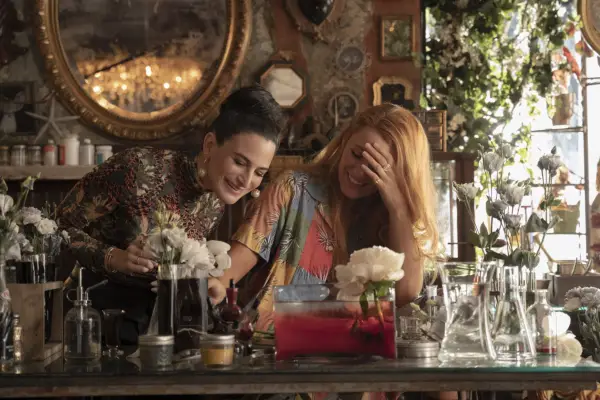 Jenny Slate and Blake Lively star in It Ends With Us standing together and smiling