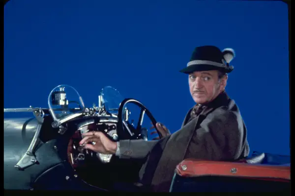 David Niven driving a car in Casino Royale
