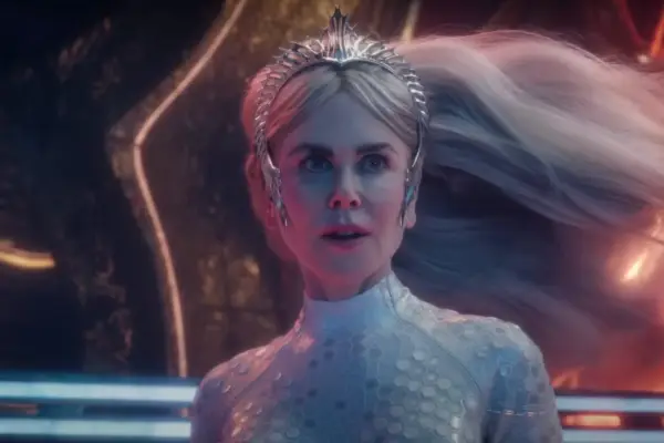 Nicole Kidman plays Atlanna wearing a white outfit and silver tiara