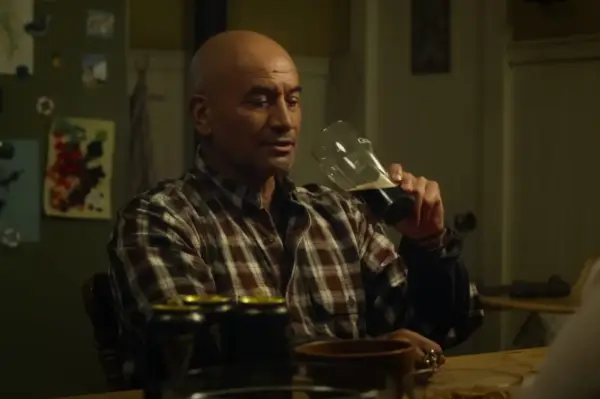 Temuera Morrison plays Tom Curry drinking from a glass