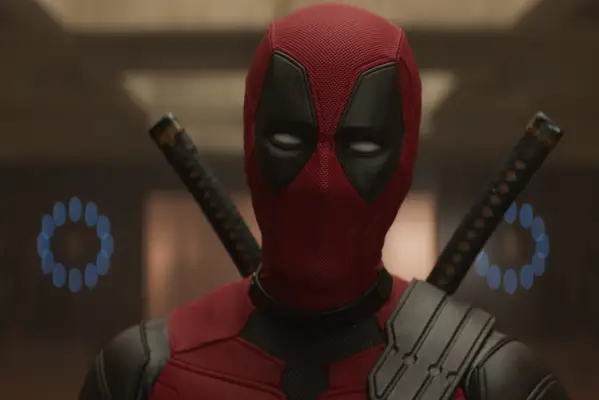 Ryan Reynolds as Deadpool in Deadpool and Wolverine in his red and black suit