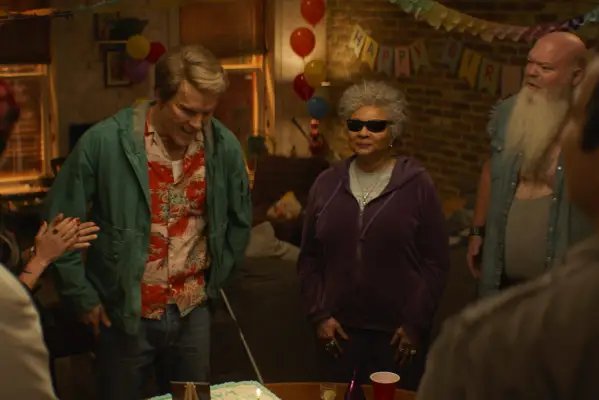 Ryan Reynolds as Wade Wilson and Leslie Uggams as Blind Al in Deadpool & Wolverine at a party together