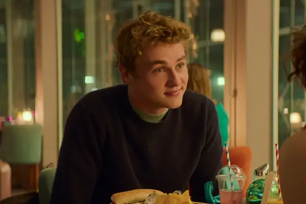 Love at First Sight. Ben Hardy as Oliver Jones in Love at First Sight wearing a dark sweater, smiling