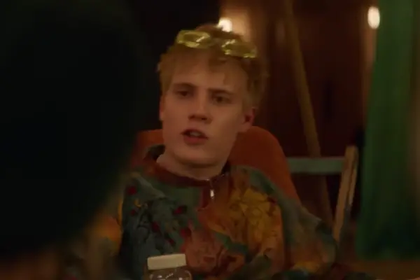 Tom Taylor plays Luther Jones in Love at First Sight with glasses on his head