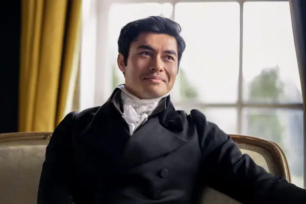 Henry Golding plays Mr. William Elliot