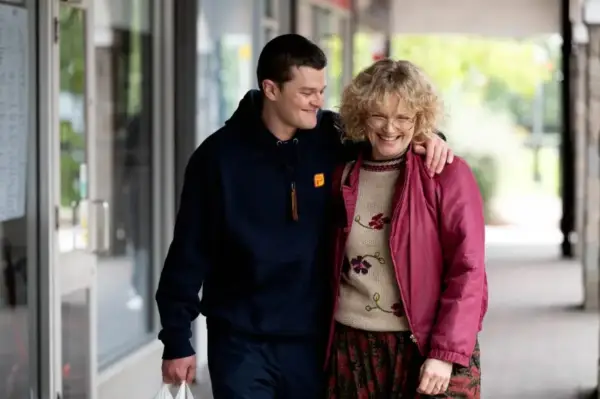 Robert Aramayo as John Davidson and Maxine Peake as Dottie Achenbach in I Swear