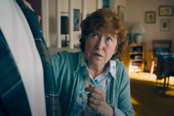 Neva Howell plays Martha Kent in Superman, looking up at her adoptive son (out of shot) in a stern-yet-encouraging manner