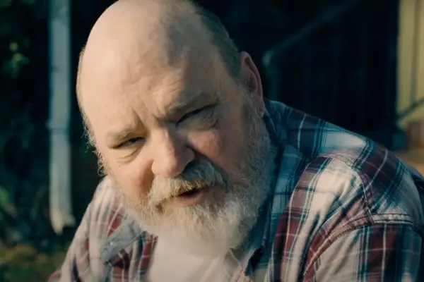 Pruitt Taylor Vince plays Pa Kent in Superman; this close-up shot sees him in conversation with his son in the garden of their family home