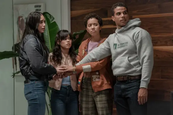 (L-R) Melissa Barrera, Jenna Ortega, Jasmin Savoy Brown and Mason Gooding in Scream VI putting their hands together