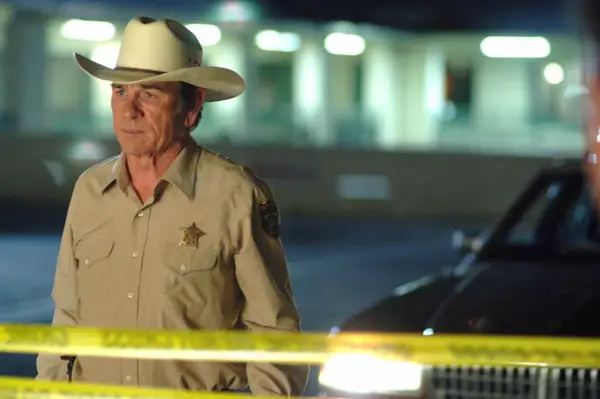 Tommy Lee Jones in No Country for Old Men by police tape