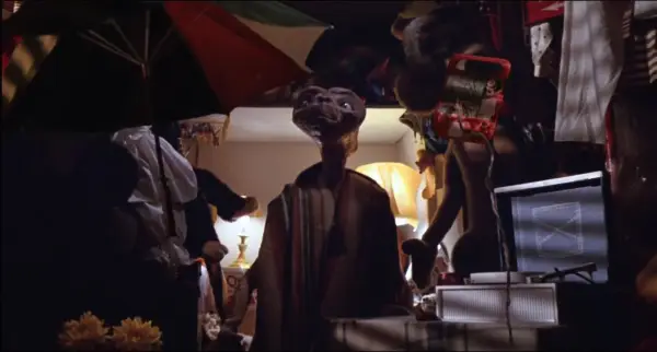 Helen Mirren, Sir Ben Kingsley, Pierce Brosnan, and Celia Imrie in The Thursday Murder Club. The men are sat on a sofa and the women are stood either side of it.