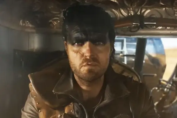 Tom Burke plays Praetorian Jack in Furiosa: A Mad Max Saga driving a vehicle