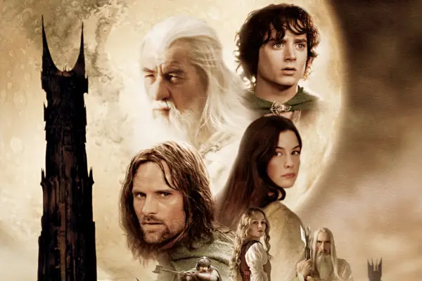 The Lord of the Rings: The Two Towers key art, showing a mix of characters with the towers