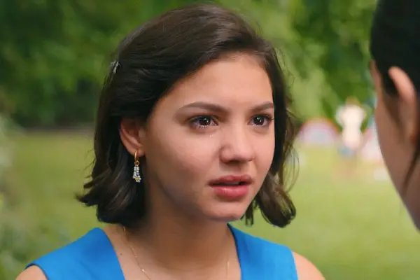Samantha Lorraine as Lydia in You Are So Not Invited to My Bat Mitzvah wearing a blue dress and looking sad