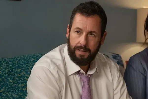 Adam Sandler as Danny Friedman in You Are So Not Invited to My Bat Mitzvah, wearing a white shirt and pink tie