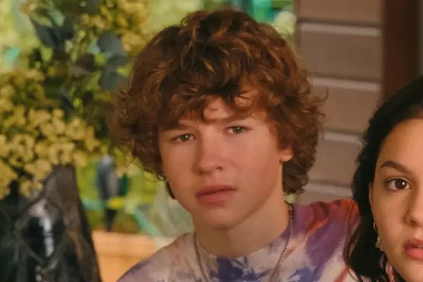 Dylan Hoffman as Andy Goldfarb in You Are So Not Invited to My Bat Mitzvah wearing a tie-dye shirt