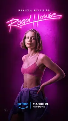 Daniela Menchor poses in a crop-top with her hands on her waist as Ellie for Road House.