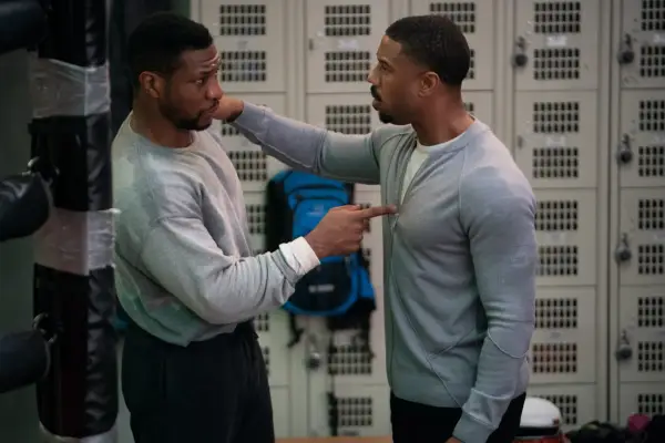 Jonathan Majors as Damian Anderson and Michael B Jordan as Adonis Creed in Creed III.