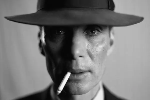 Cillian Murphy as Oppenheimer with a cigarette in his mouth.