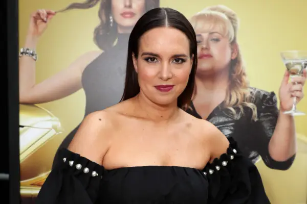 Ingrid Oliver in a black dress