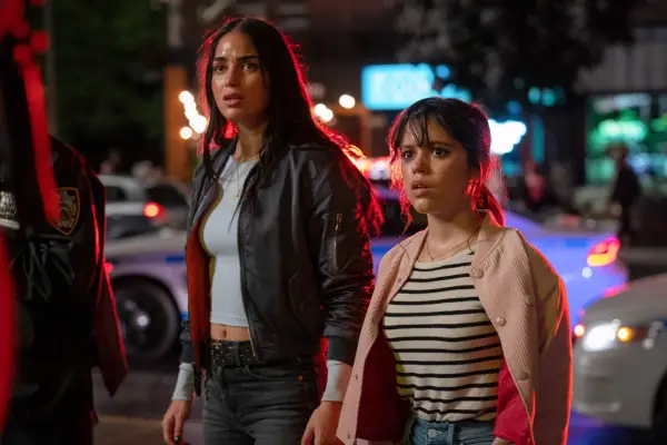 Melissa Barrera and Jenna Ortega in Scream VI standing and looking shocked