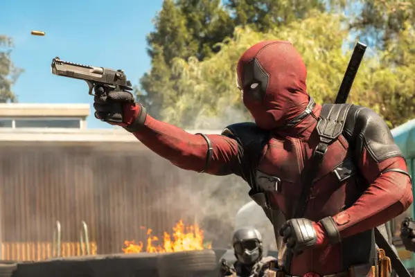 Deadpool shooting a gun