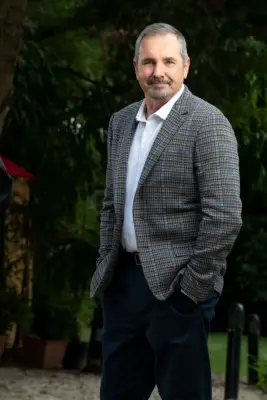 Alan Fletcher as Dr Karl Kennedy in Neighbours.