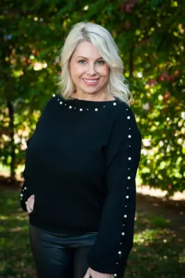 Melissa Bell as Lucy Robinson in Neighbours.