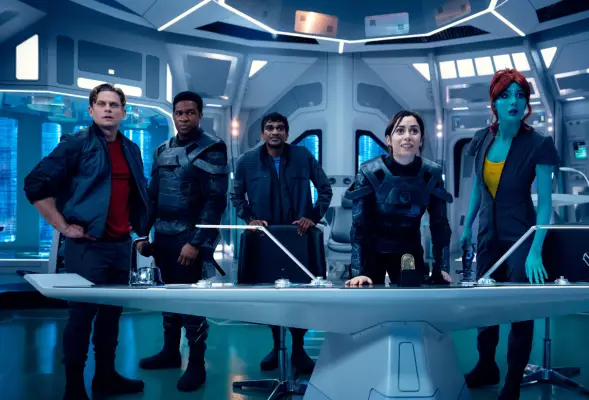 Billy Magnussen, Osy Ikhile, Paul G. Raymond, Cristin Milioti and Milanka Brooks in Black Mirror, stood together at the console of the USS Callister