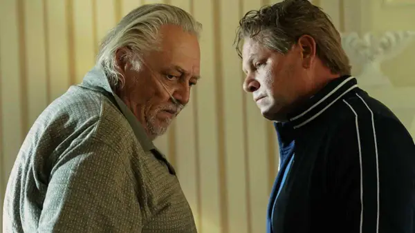 A.C. Peterson and Domenick Lombardozzi in a still from 