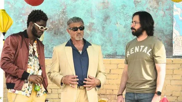 Sylvester Stallone, Martin Starr, and Jay Will in a still from 